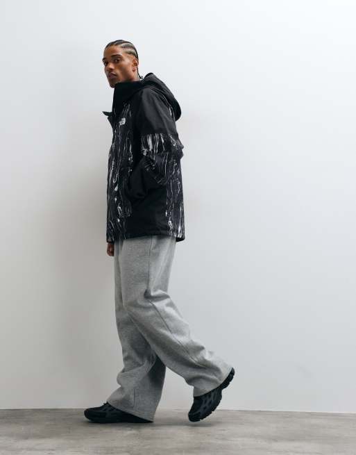 The North Face Slider jacket in black print, 2 of 5