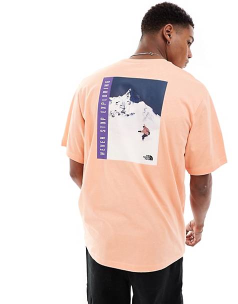 The North Face Snowboard retro back graphic t-shirt in orange Exclusive at ASOS