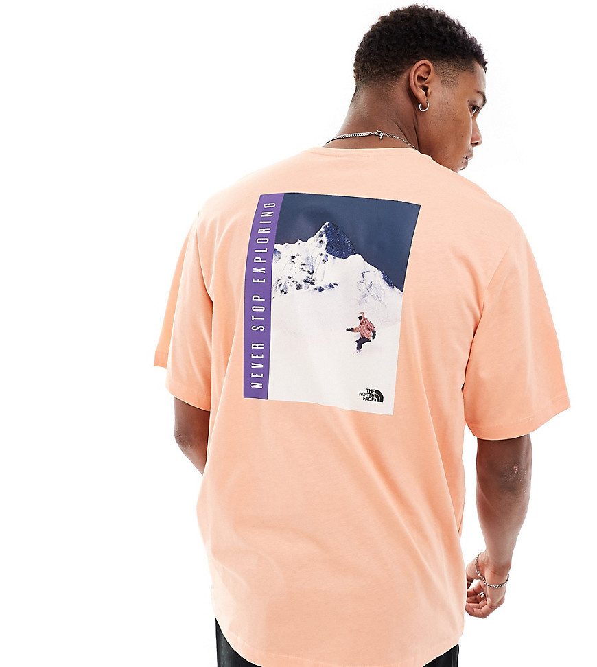 The North Face Snowboard retro back graphic t-shirt in orange Exclusive at ASOS