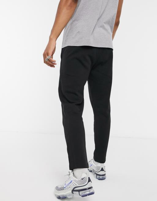 Champion - Brune unisex-joggingbukser med lille logo