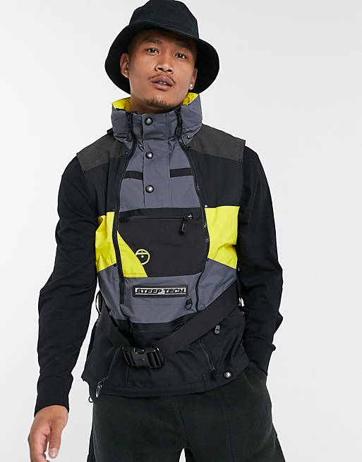 The North Face Steep Tech Apogee vest in yellow/gray | ASOS