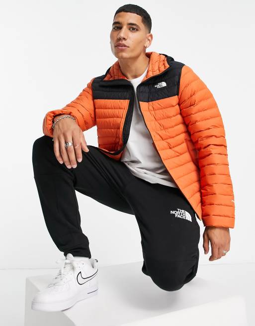 Orange and black 2025 north face jacket