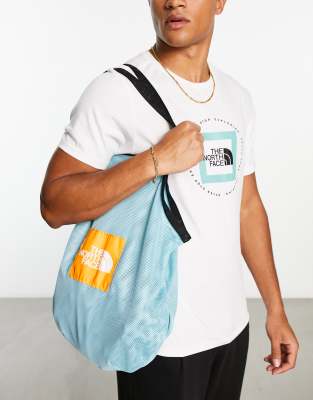 The North Face string tote bag in blue - ASOS Price Checker