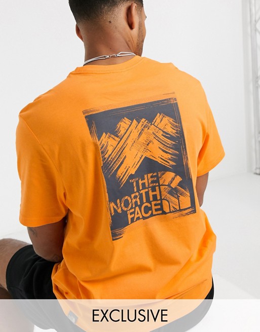 The North Face Stroke Mountain t-shirt in orange Exclusive at ASOS