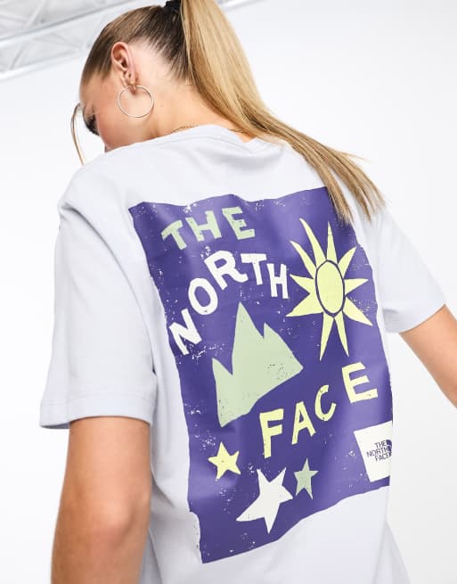 The North Face - Sun and Stars - Ruimvallend T-shirt met print op de achterkant in lichtblauw
