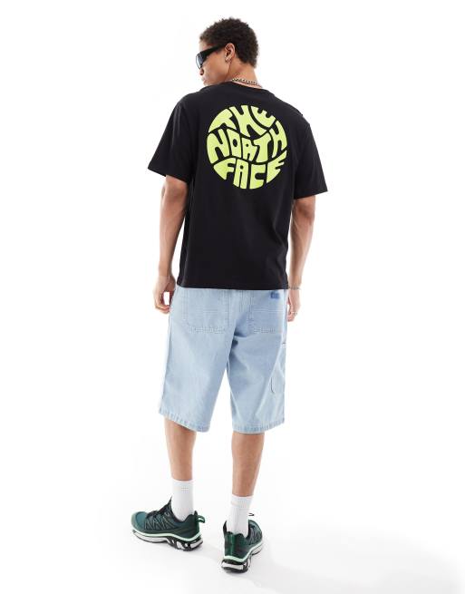 The North Face - T-shirt color lime con logo circolare sul retro