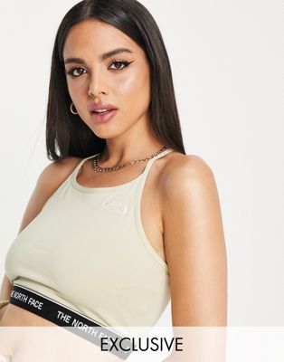 The North Face tank top in beige Exclusive at ASOS
