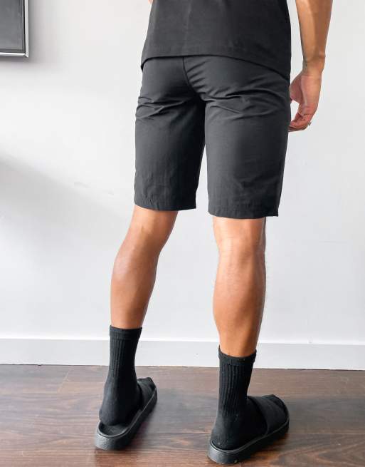 fee ballon Poging The North Face Tanken shorts in black | ASOS