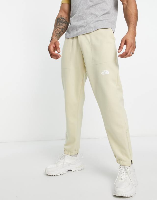 The North Face Tech sweatpants in beige Exclusive at ASOS