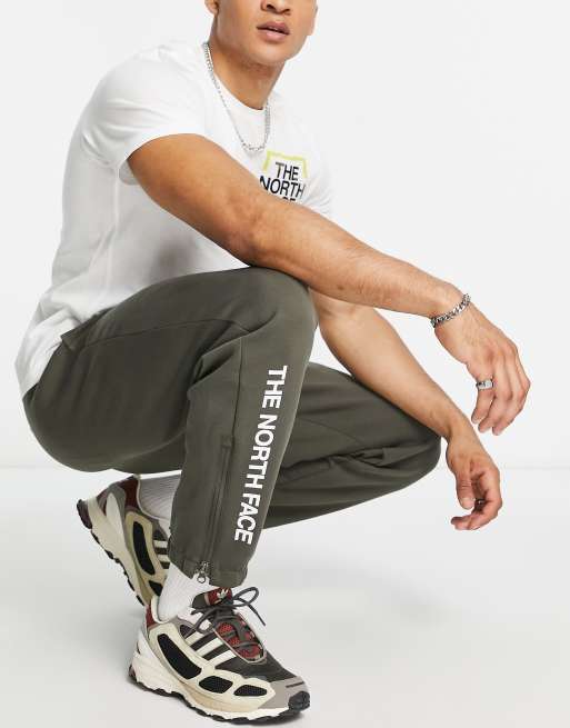 The North Face Tight sweatpants in khaki Exclusive at ASOS