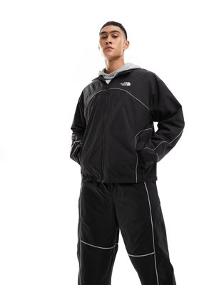 The North Face Tek woven track jacket with reflective piping in black ...