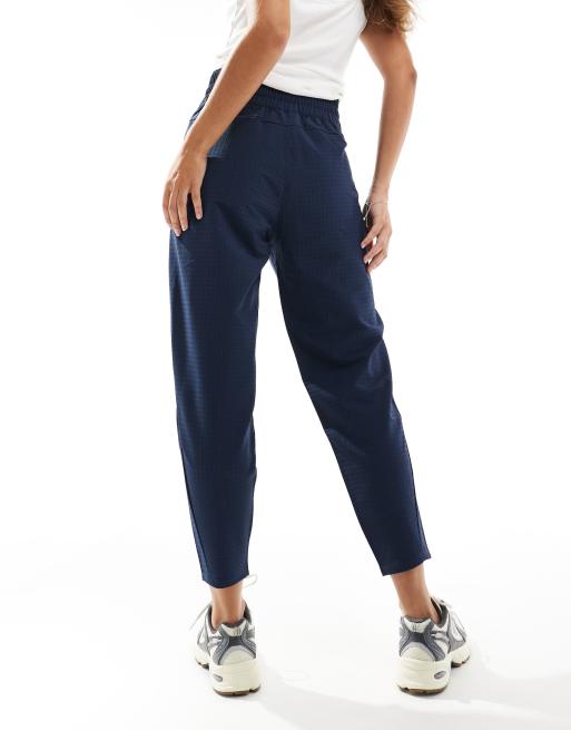 The North Face Tekware Grid track pants in summit navy | ASOS