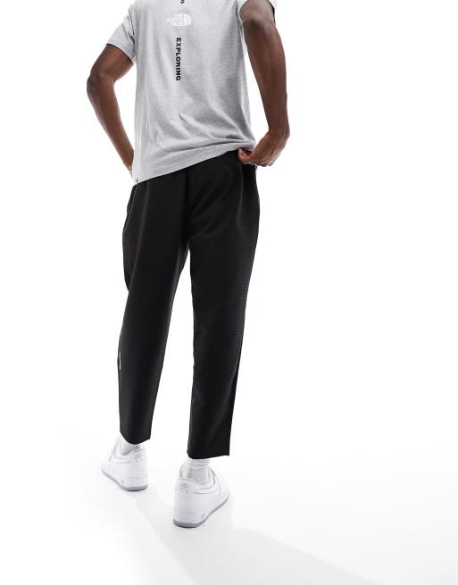 The North Face Tight sweatpants in gray Exclusive at ASOS