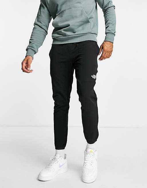 The North Face Tekware trackies in black | ASOS