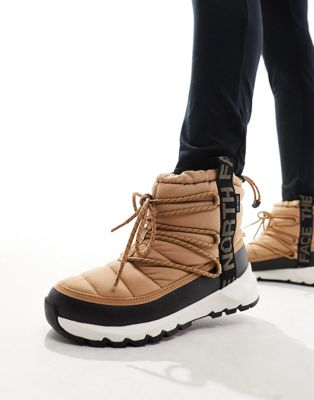 The North Face Thermoball insulated lace up boots in beige and black