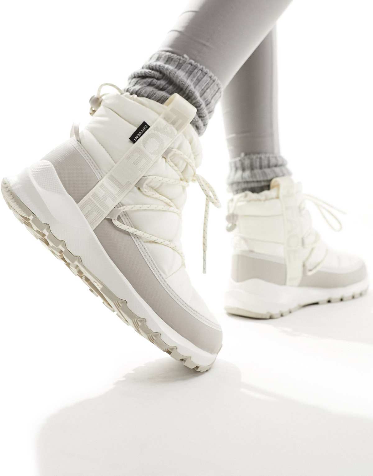 The North Face Thermoball insulated lace up boots in cream and gray