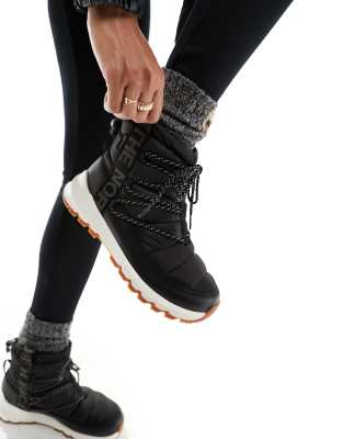 The North Face - Thermoball - Isolierte Schnürstiefel in Schwarz und Weiß