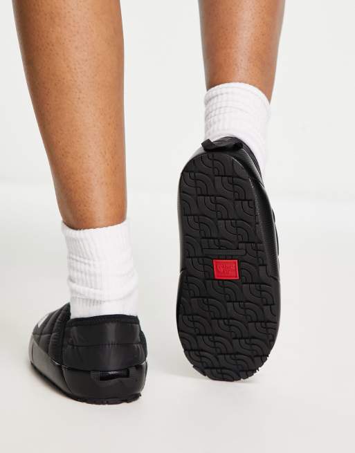 The North Face Thermoball Traction V insulated mules in black ASOS