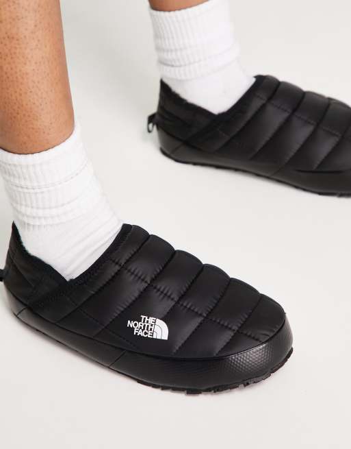 The North Face Thermoball Traction V insulated mules in black ASOS