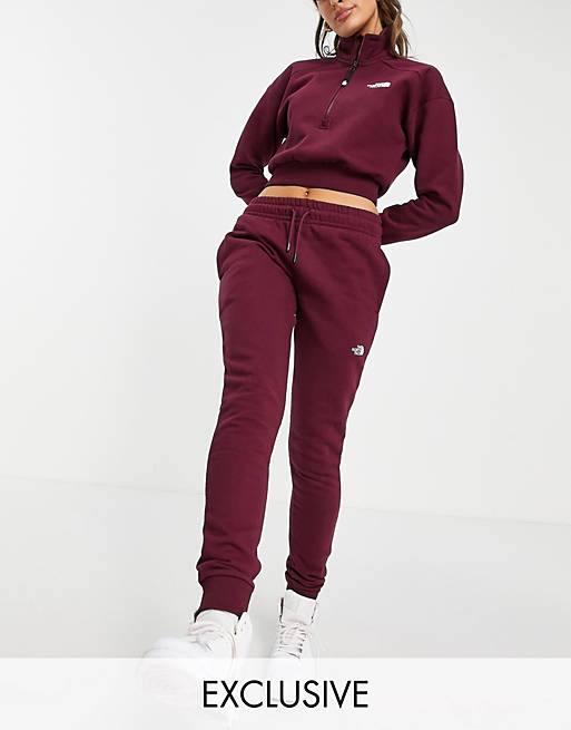 The North Face Tight joggers in burgundy Exclusive at ASOS | ASOS