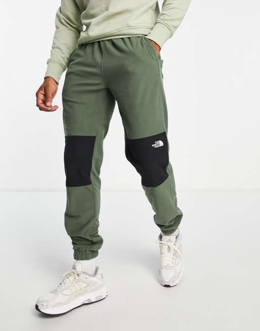 The North Face - TKA Glacier -Joggingbukser i kakifarvet og sort fleece