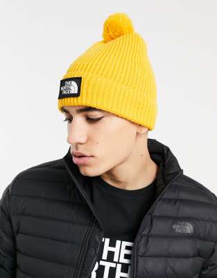 yellow north face cap