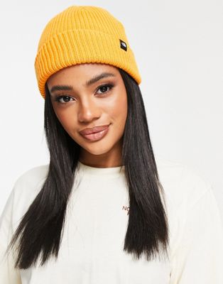 The North Face TNF ribbed knit beanie in orange