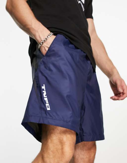 The North Face TNF X woven belted shorts in navy and khaki