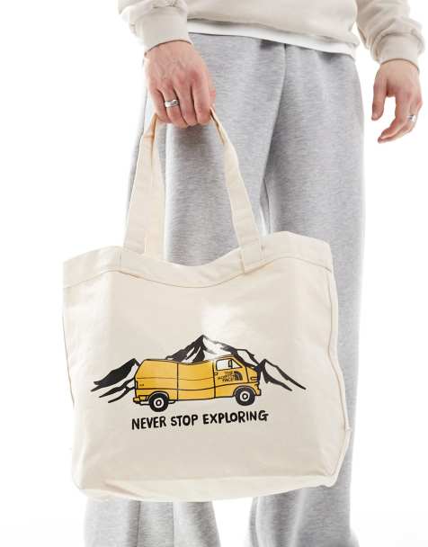 The North Face – Torba typu tote w kolorze ecru z nadrukiem z kamperem i logo - view 1