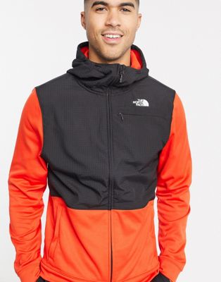 the north face orange and black jacket