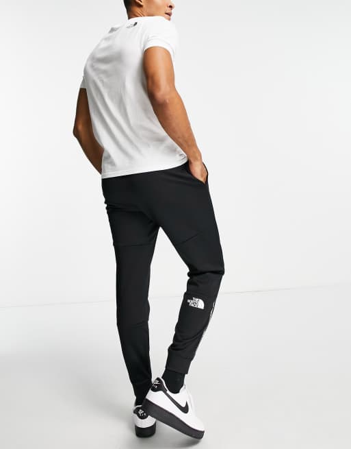 Vorm van het schip uitgehongerd Terug, terug, terug deel The North Face Train N Logo jogger in black | ASOS