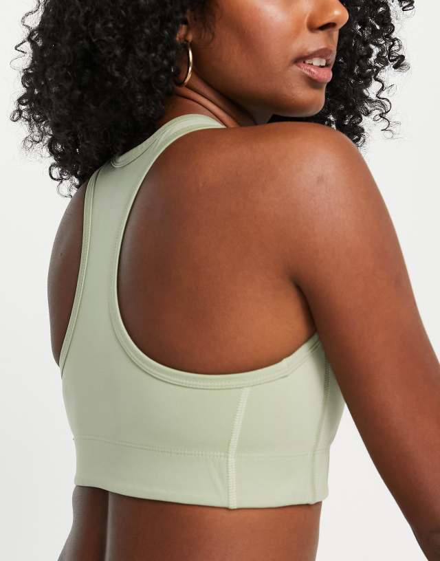 The North Face Training Midline logo medium support sport bra in green