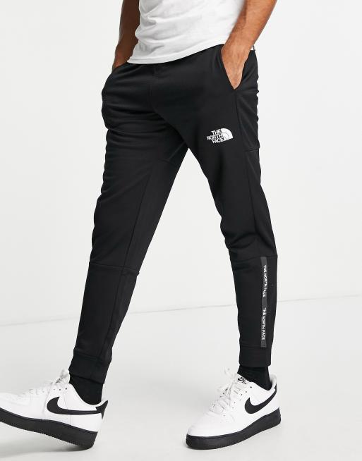 The North Face Tight sweatpants in black Exclusive at ASOS