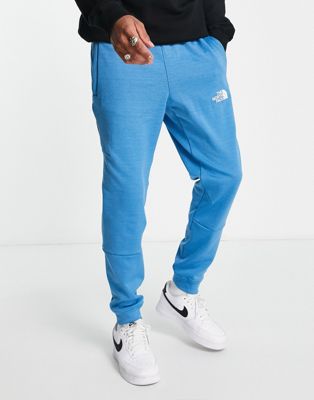 The North Face Training Mountain Athletic joggers in blue
