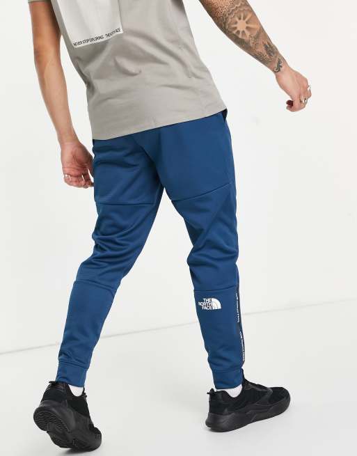 The North Face Training Mountain Athletic joggers in blue