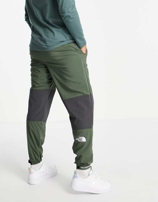 The North Face Training Mountain Athletic joggers in khaki ASOS