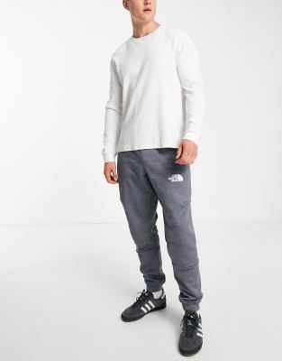 The North Face Training Mountain Athletic trackies in light grey  - ASOS Price Checker