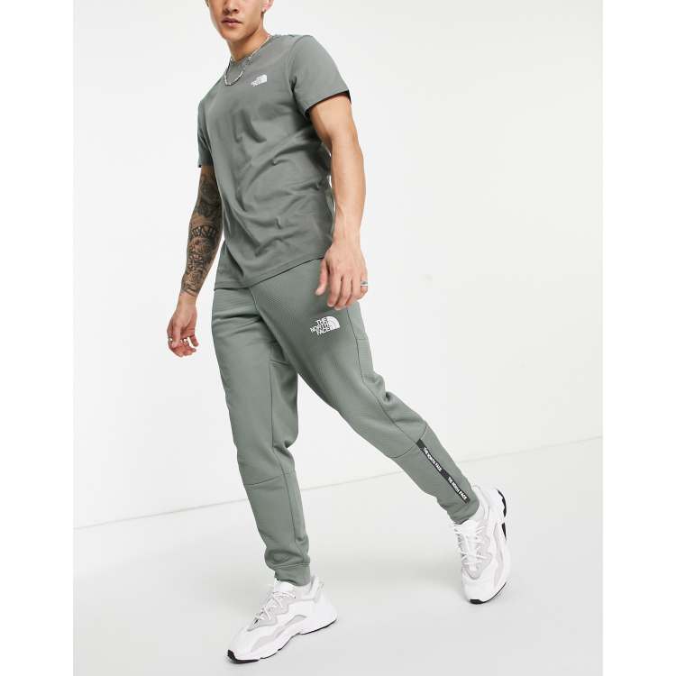 The north face outlet mittellegi track pants grey