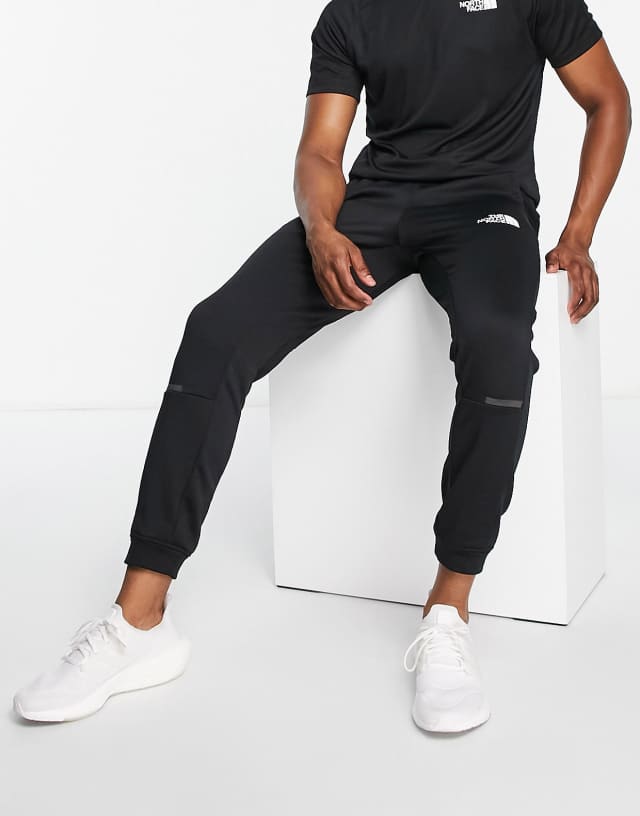 The North Face Training Mountain Athletics fleece sweatpants in black