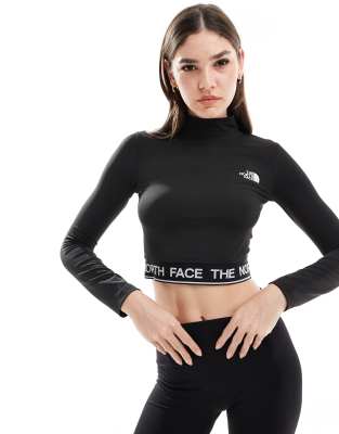 The North Face - Training Performance - Langärmliges Cropped-T-Shirt in Schwarz