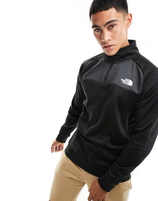 The North Face Training Reaxion 1 4 zip fleece in black ASOS