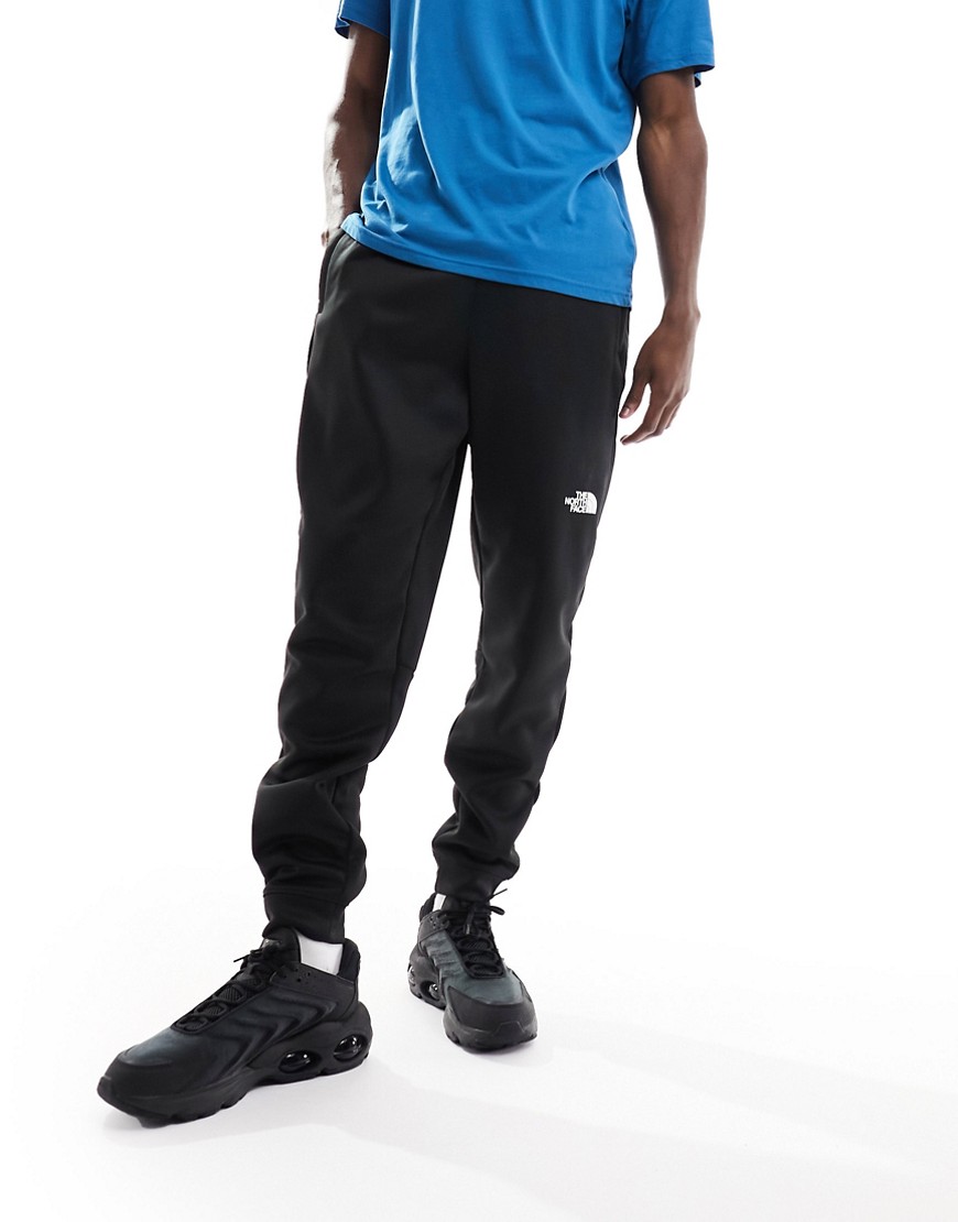 The North Face Training Reaxion fleece joggers in black