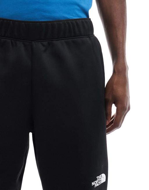 The North Face Training Reaxion fleece joggers in black