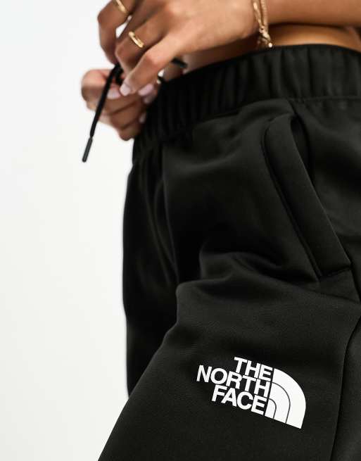 The North Face Training Reaxion fleece trackies in black, 2 of 4