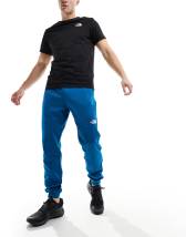 Under Armour Challenger Pro joggers in black and blue