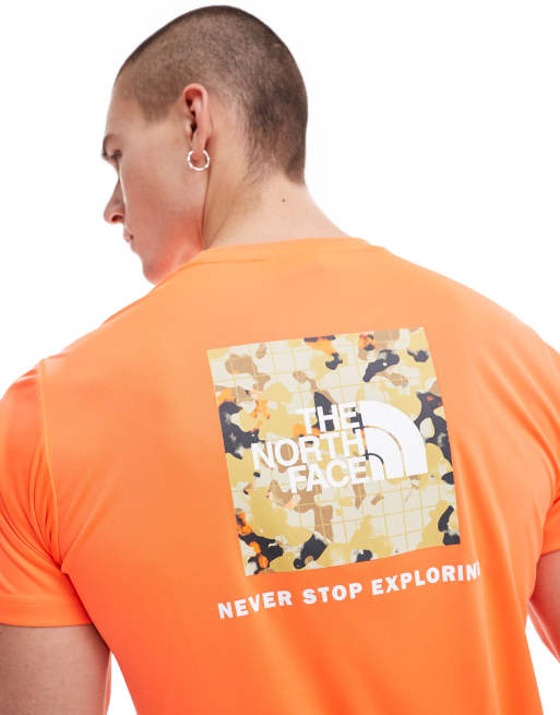 The North Face Training Reaxion Redbox back print t shirt in orange ASOS