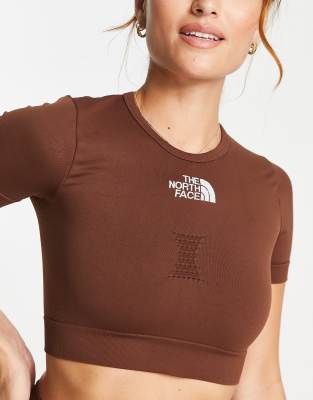 The North Face Training seamless performance cropped t-shirt in brown Exclusive at ASOS