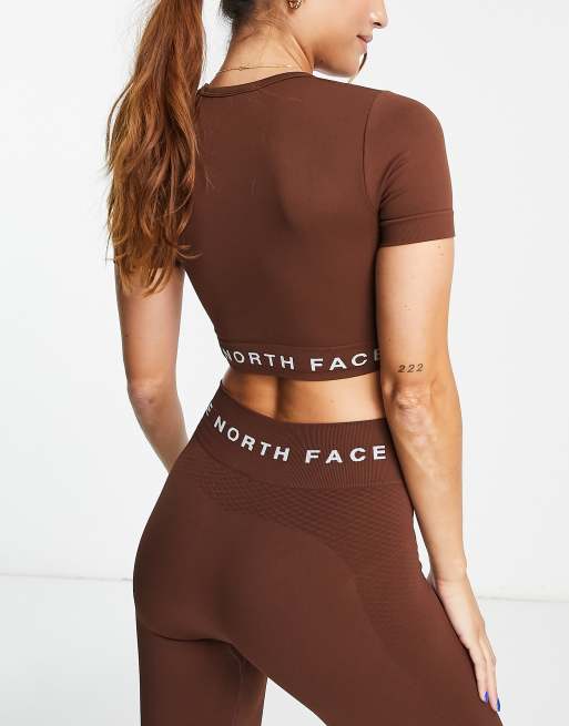 The North Face Training seamless performance sports bra in brown Exclusive  at ASOS