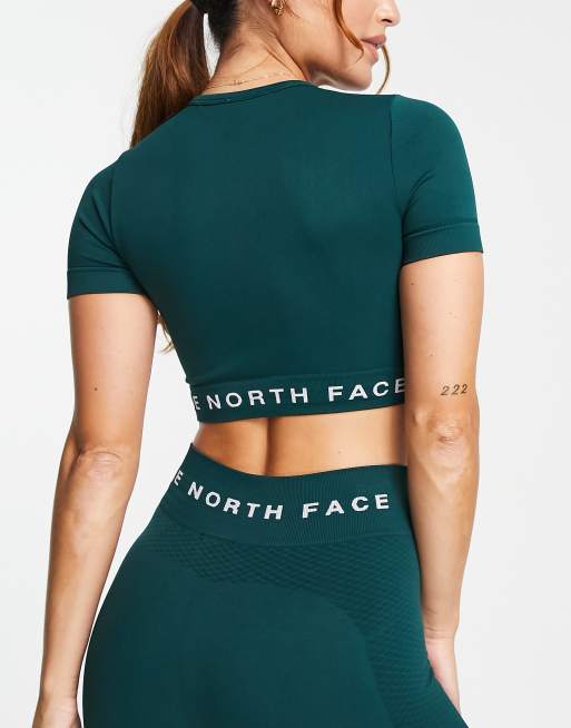 The North Face Training seamless performance sports bra in green Exclusive  at ASOS