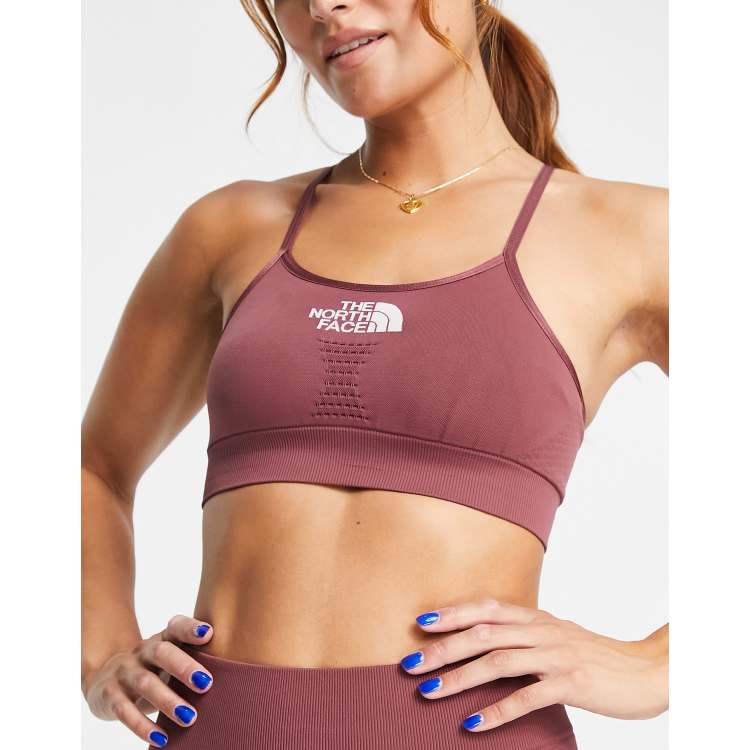 The North Face Training seamless performance sports bra in black Exclusive  at ASOS